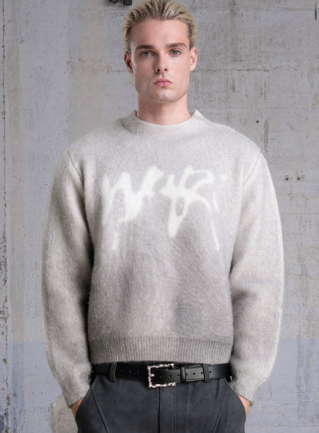 Faded “PUFFY” Knit Sweater