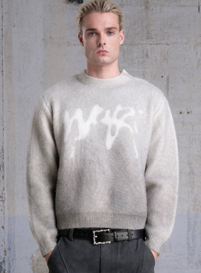 Faded “PUFFY” Knit Sweater