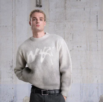 Faded “PUFFY” Knit Sweater